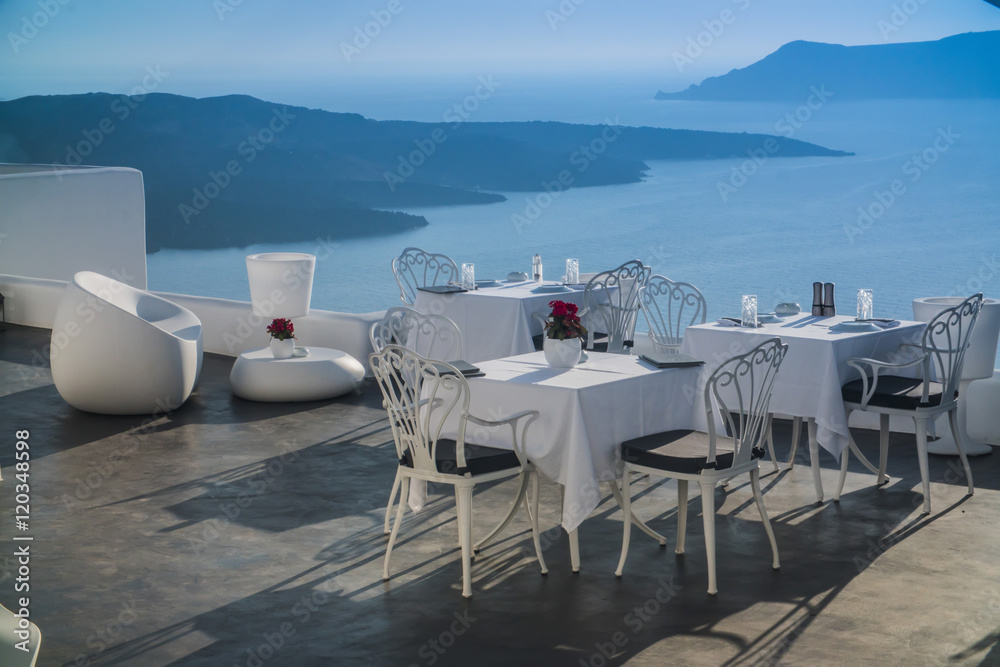 white table in outdoor restaurant in Greece, Santorini