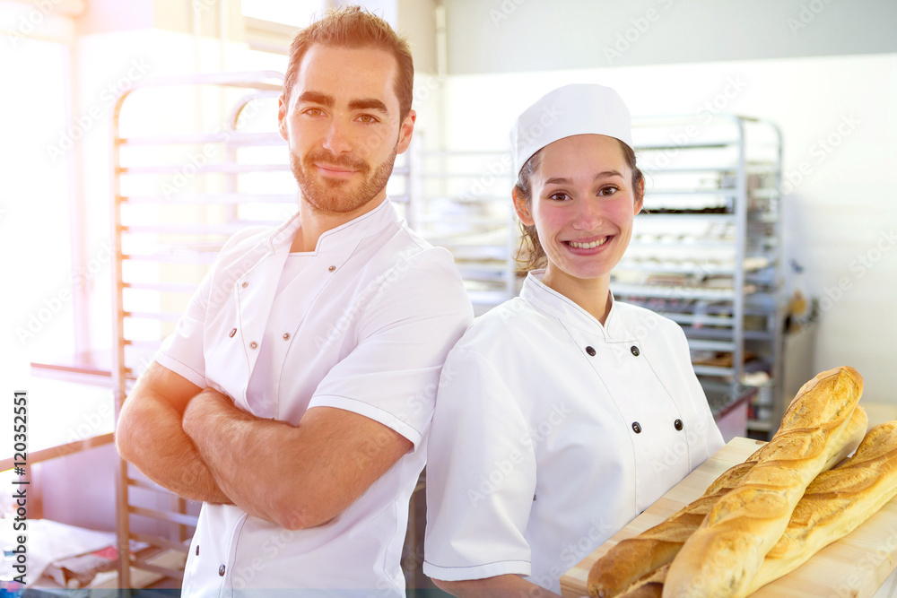 Obraz premium Team of bakers working at the bakery