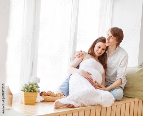 pregnancy. happy family future parents pregnant mother and fathe