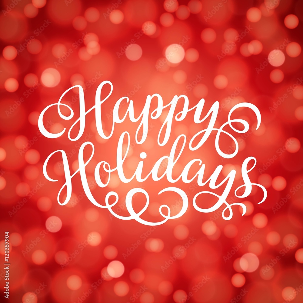 Happy Holidays hand lettering inscription on red bokeh light background Happy Holidays hand lettering inscription on red bokeh light background