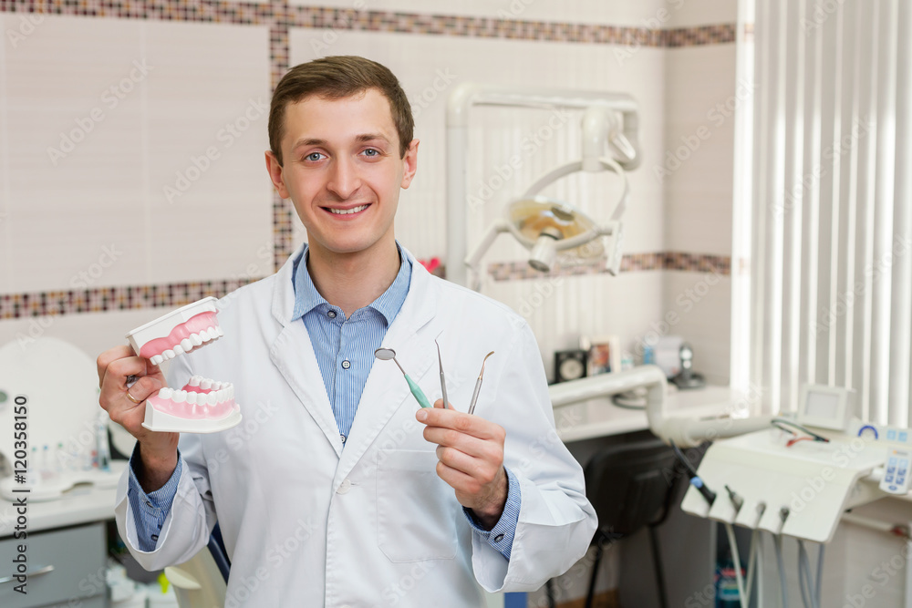 Young dentist in the office Young dentist in the office