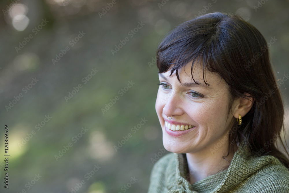 Athletic Woman with Brown Hair and Beautiful Green Eyes