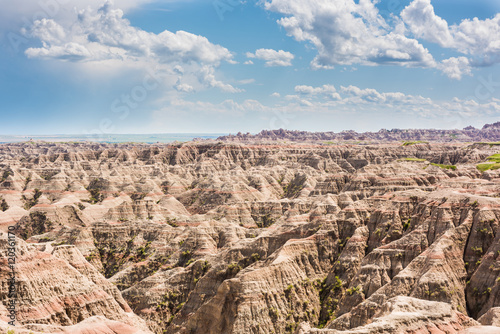 Badlands national park overlook with many canyons and clouds