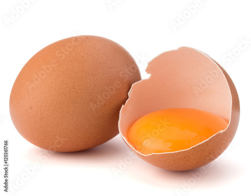 Broken egg in eggshell half and raw egg isolated on white backgr