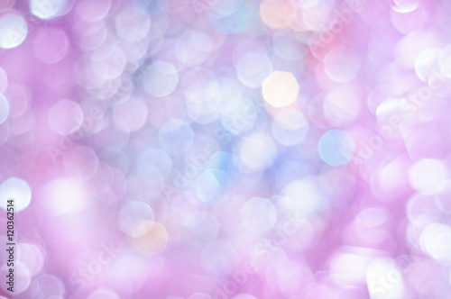Blurred pale lilac and blue background with bokeh lights