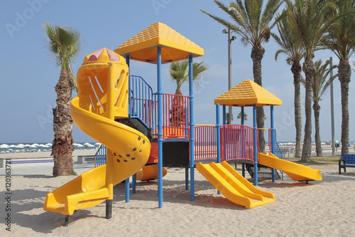 orange toboggan in the beach