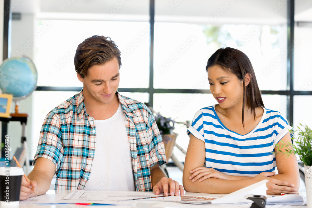 Two office workers at the desk Two office workers at the desk