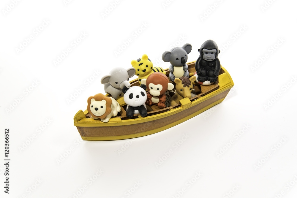Fototapeta premium Group of animals in the small yellow boat
