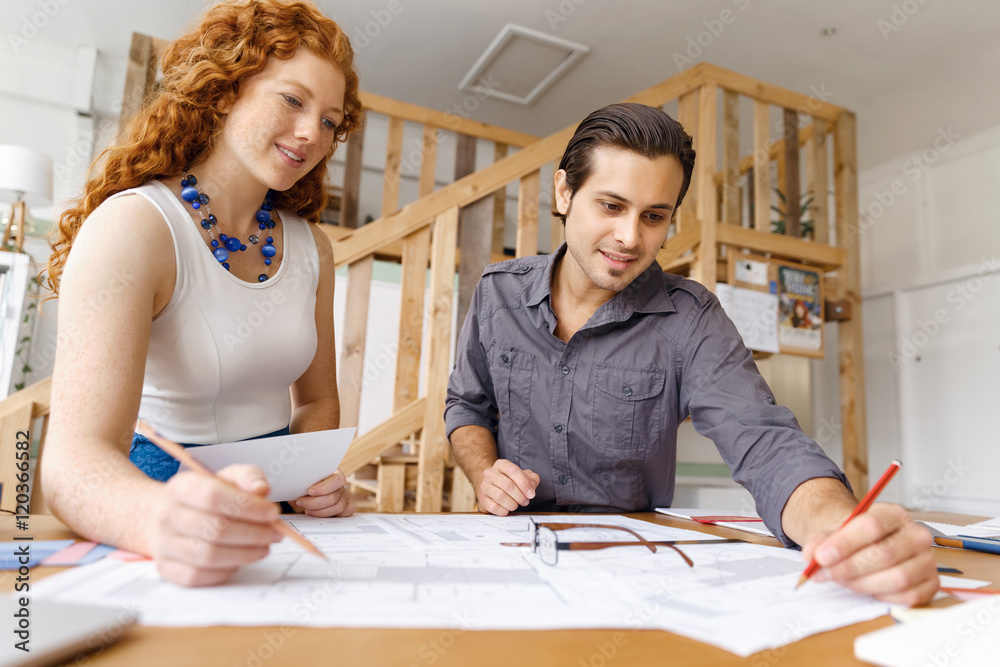 Two young architects in office Two young architects in office