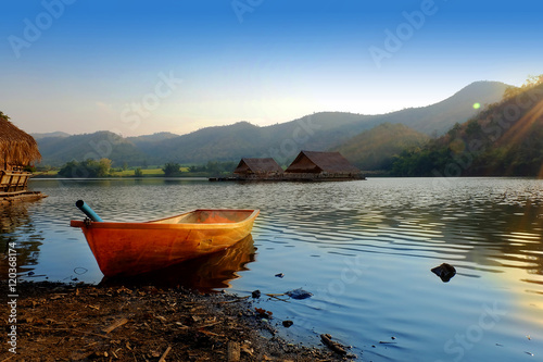 Canvastavla boat in  the lagoon with mountain background at khao wong reservoir Suphanburi p