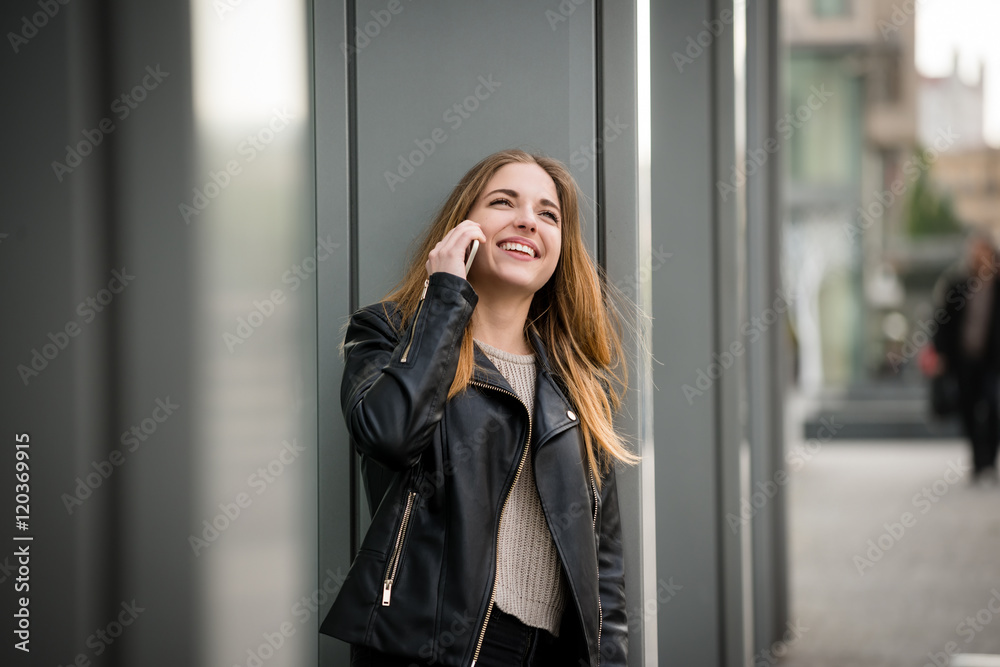 On phone - teen in street On phone - teen in street