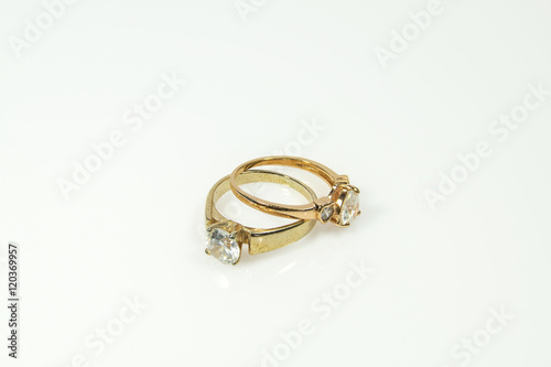 Gold ring with diamonds isolated on white background.