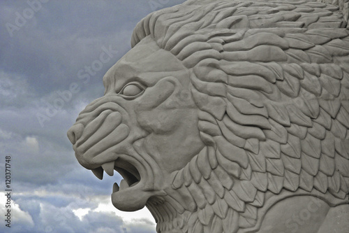 the muzzle of a lion sculpture white marble
