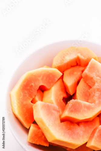 Fresh papaya slices on plate and ready for eating