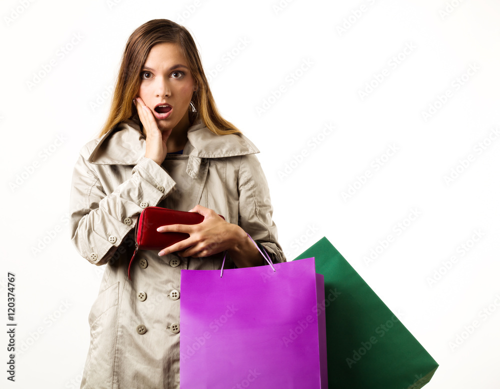 Young woman on autumn sale with colorful bags. Young woman on autumn sale with colorful bags.