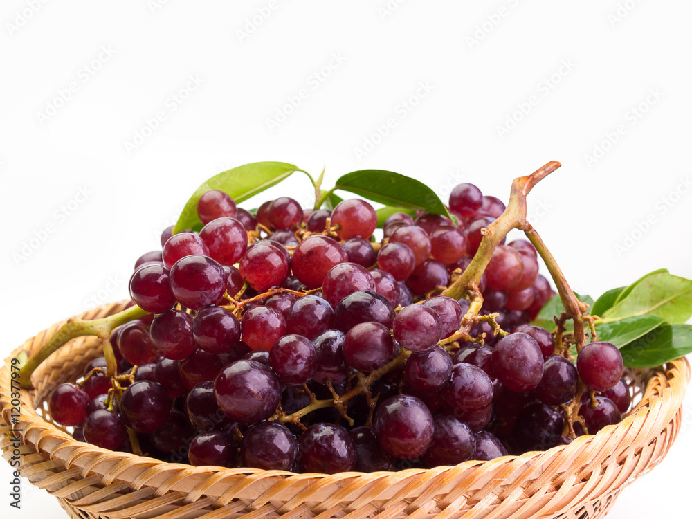 Close up red grape with leaves Close up red grape with leaves