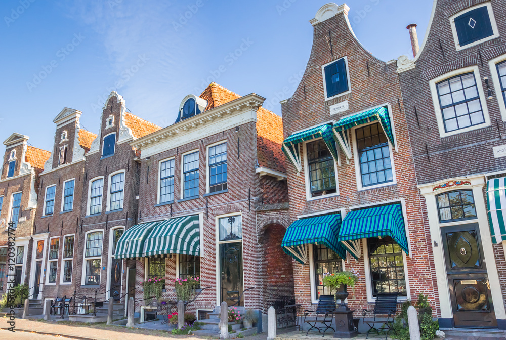 Facades of historical houses in the harbor of Blokzijl