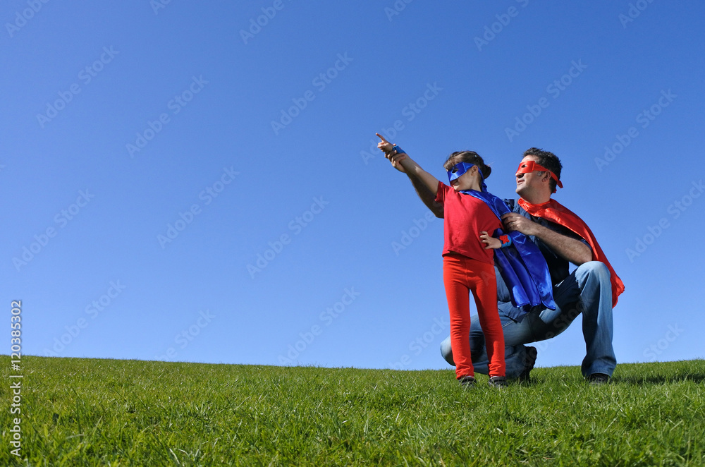 Superhero father shows his daughter how to be a superhero Superhero father shows his daughter how to be a superhero
