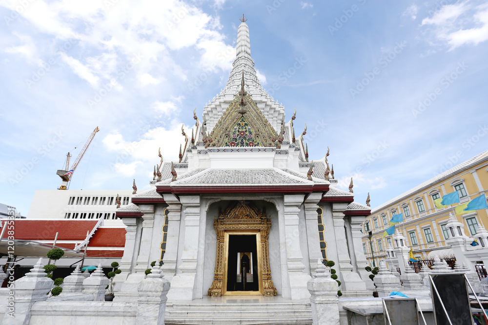 The City Pillar Shrine of Bangkok on the background blue sky.