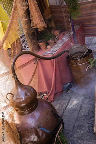 recreation of an old brass alembic for the production of alcoholic beverages
