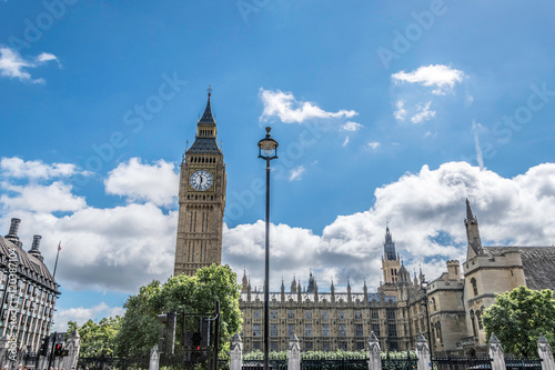 Big Ben and Westminster Palace, London, UK with blue sky and clouds