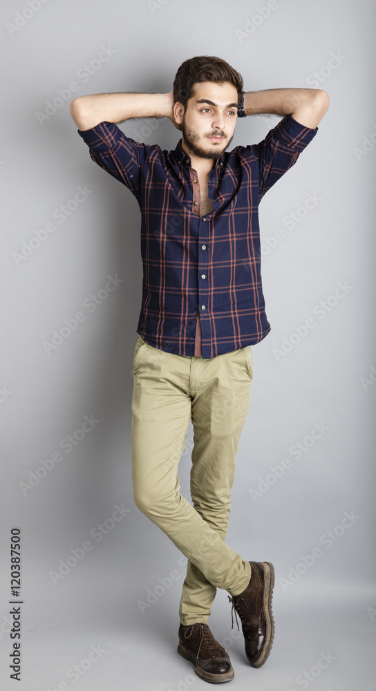 Caucasian Old boy isolated on grey background inside studio Caucasian Old boy isolated on grey background inside studio