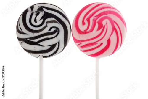 Assorted colors lollipops isolated on white background, close-up. photo