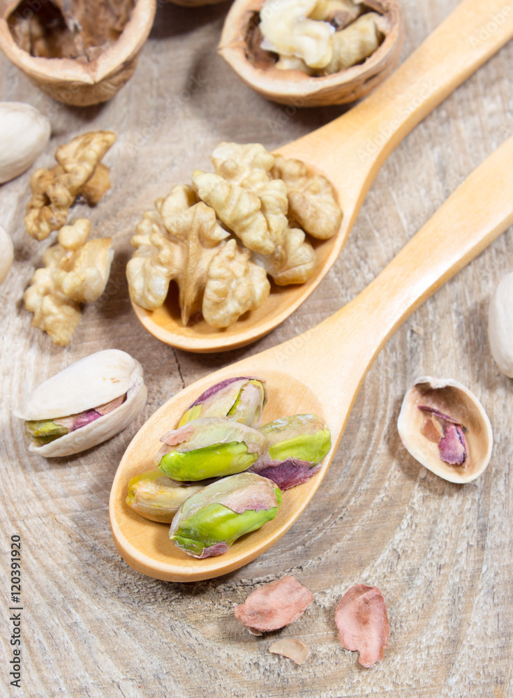 Closeup of a walnut and pistachios. Closeup of a walnut and pistachios.