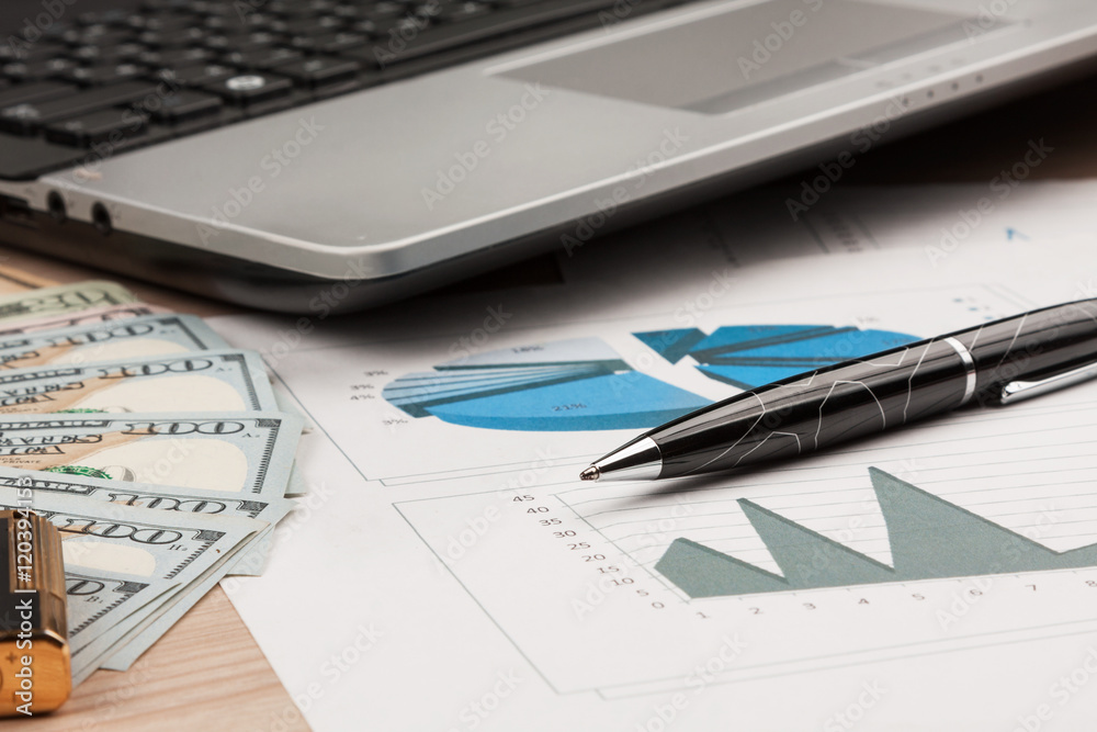 Working businessman desk, Lighter and laptop and money Working businessman desk, Lighter and laptop and money