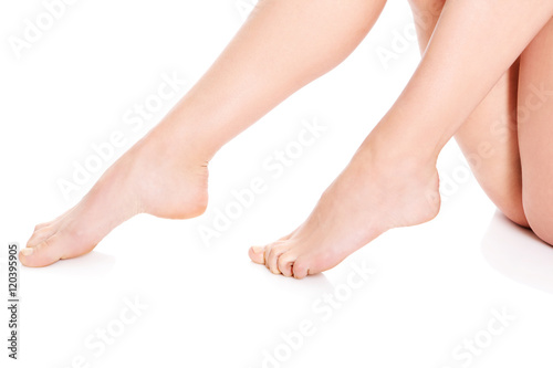 Female feet isolated on a white background.