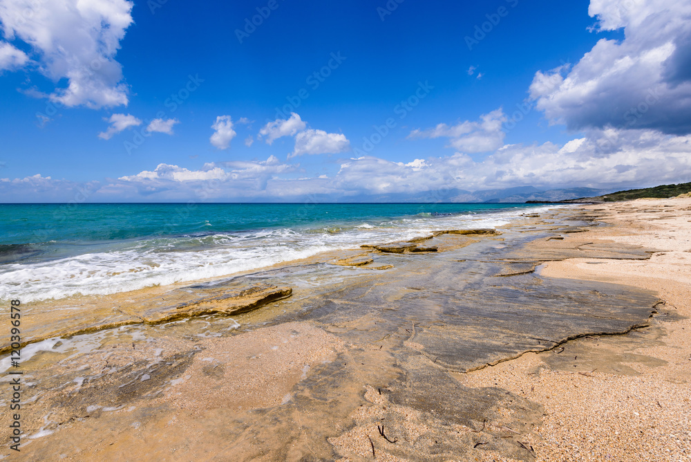 Beautiful and calm beach near Acharawi village, Corfu, Greece.