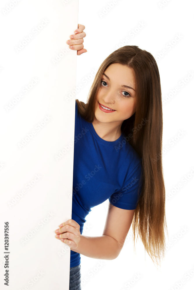 Happy woman with blank board.