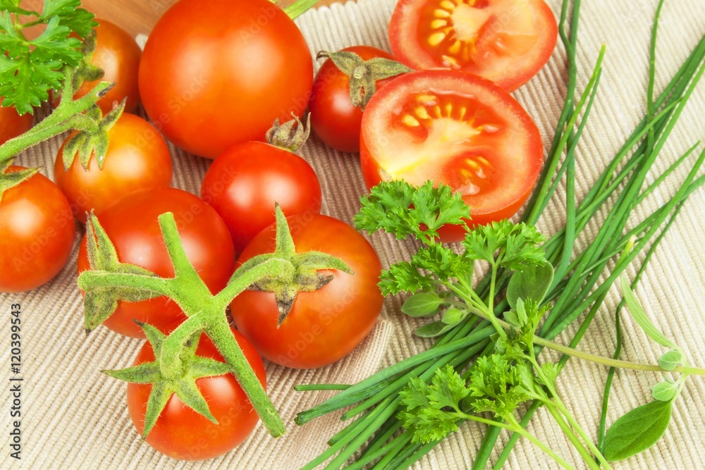 Fresh cherry tomatoes on rustic wooden background. Fresh vegetables on the kitchen table. Preparation of dietary supplements.
Fresh cherry tomatoes on rustic wooden background. Fresh vegetables on the kitchen table. Preparation of dietary supplements.