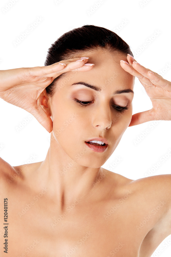 Naklejka premium Beautiful face of young woman with clean fresh skin.