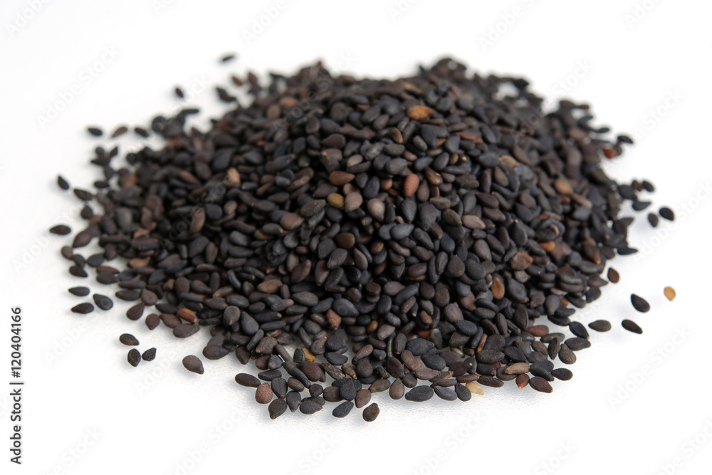 Pile of black sesame seeds isolated on white background Pile of black sesame seeds isolated on white background