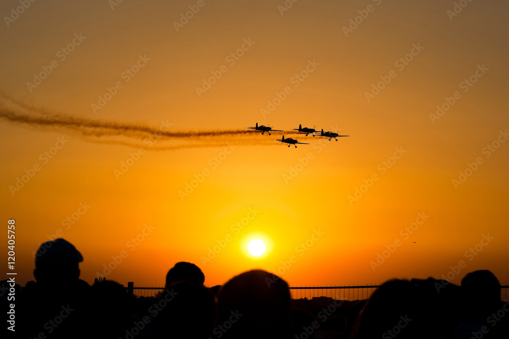 Airshow planes at sunset