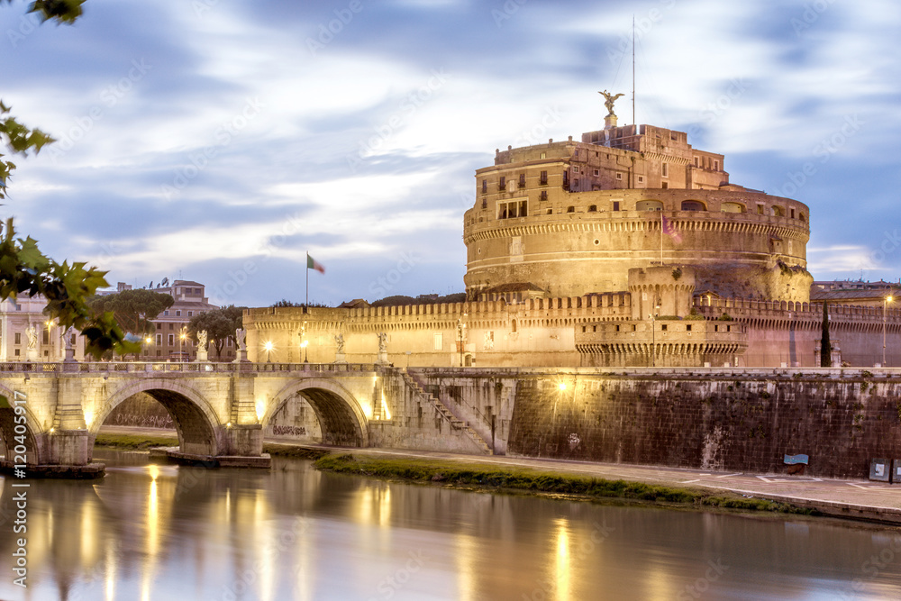 Castel Sant'Angelo, in Rome, Italy, on a cloudy evening, with river Tiber