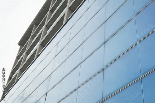 Detail of blue glass facade of a contemporary building