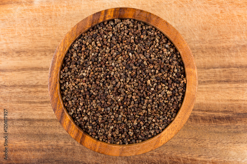 Decorticated cardamom seeds in a bowl