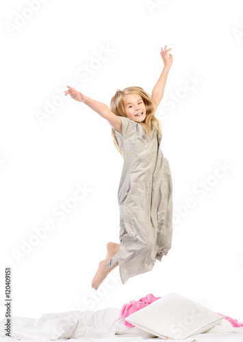 Fototapeta Naklejka Na Ścianę i Meble -  jumping in a bed
