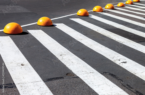 Zebra crossing with white lines on the asphalt