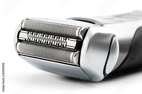 Electric shaver on white background photo