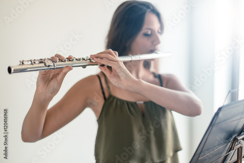 Flute playing flutist
