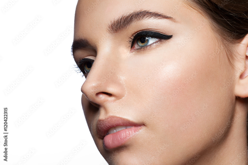 Girl with clean skin with natural make-up and the arrow on the eyes Girl with clean skin with natural make-up and the arrow on the eyes