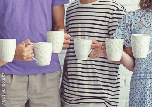 Photography Group of people holding cups of coffee together