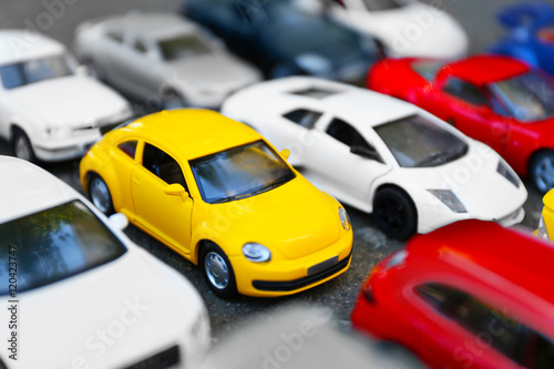 Close up of toy cars parking