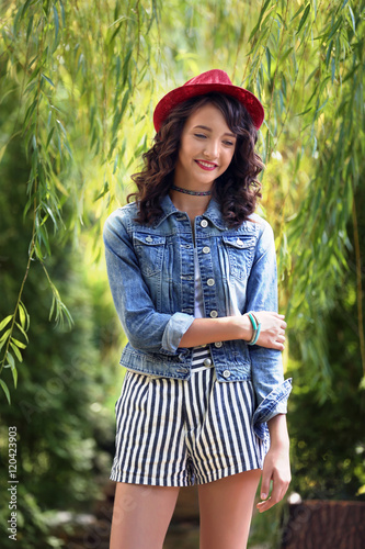 Beautiful young girl in park