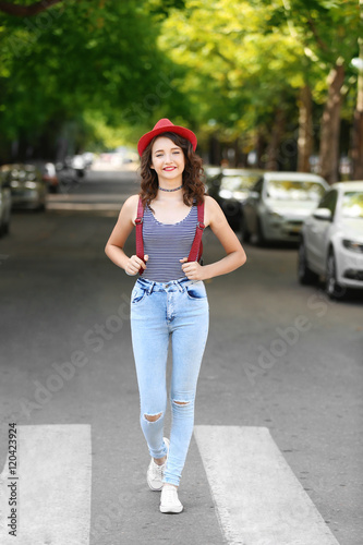 Beautiful young girl standi...