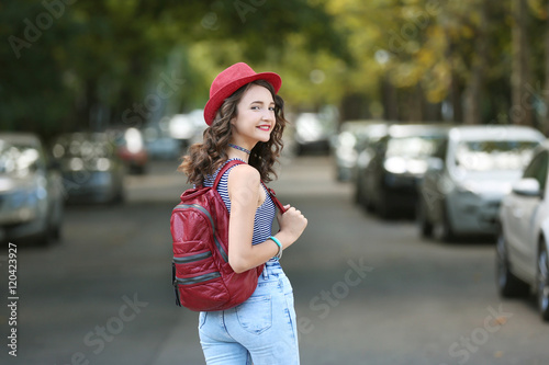 Beautiful young girl standi...