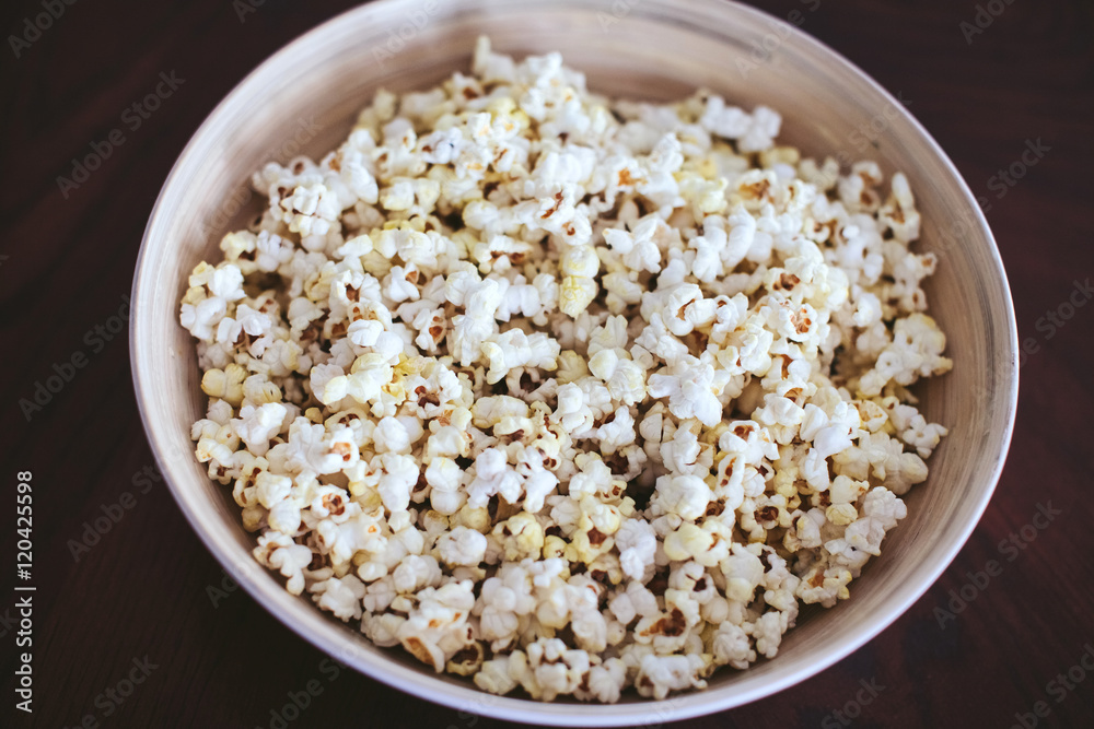 large white plate with popcorn large white plate with popcorn
